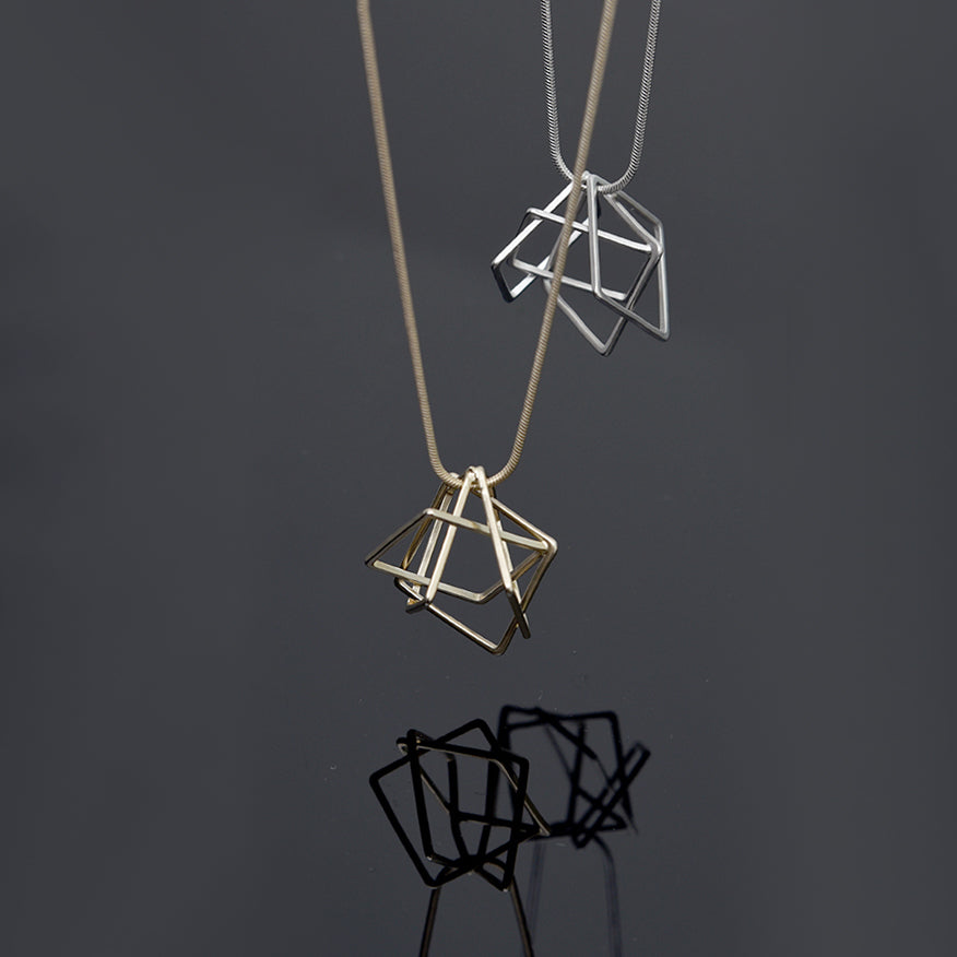 
                  
                    Relaxed Cube Necklace
                  
                