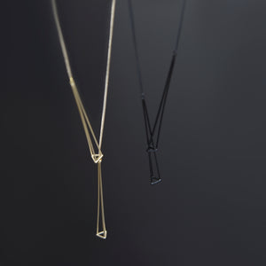 
                  
                    Glint Lariat Necklace
                  
                