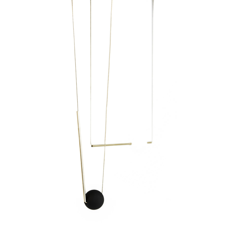 
                  
                    This geometric long necklace is made up of a long bar and orb bead.  It can be worn in different ways to fit your daily look!
                  
                