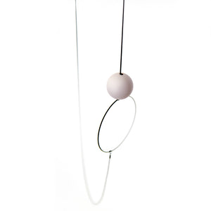 
                  
                    This playful necklace is available in many colourful options. Here we see a combination of a light pink blush orb with a black ring and black snake chain
                  
                