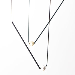 
                  
                    The striking design of this simple necklace is the perfect accessory for any elegant and professional outfit
                  
                