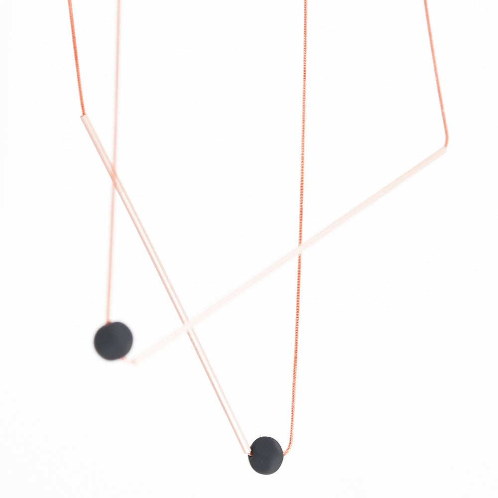 
                  
                    The striking design of this simple necklace is the perfect accessory for any elegant and professional outfit
                  
                