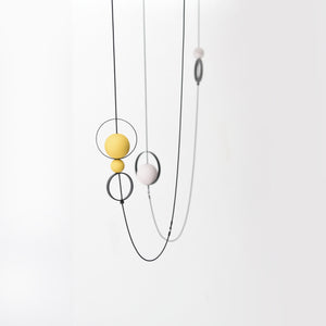 
                  
                    The playful circles of this long necklace can be moved up and down. A versatile design that can be customized to fit any taste
                  
                
