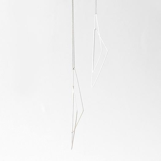 
                  
                    This simple geometric necklace was inspired by architecture and interior design
                  
                