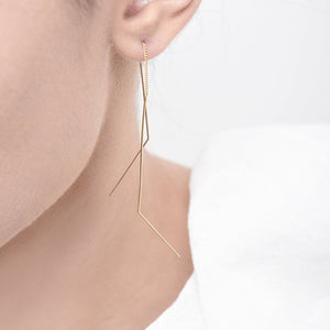 
                  
                    A delicate and minimal pair of ear drapes. Gently bent to frame the face in the most flattering way.
                  
                