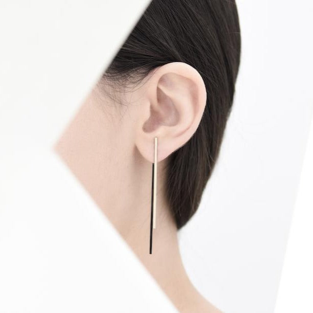 The two twin lines of these ear jackets are a sleek and classy addition to any wardrobe