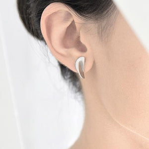 
                  
                    This combination of perpendicular half circles is a delightful geometric design. These ear studs are simple and playful and a perfect addition to any stylish outfit!
                  
                